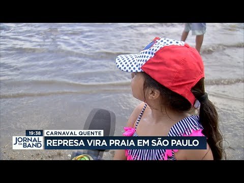 Calor faz represa virar praia em São Paulo